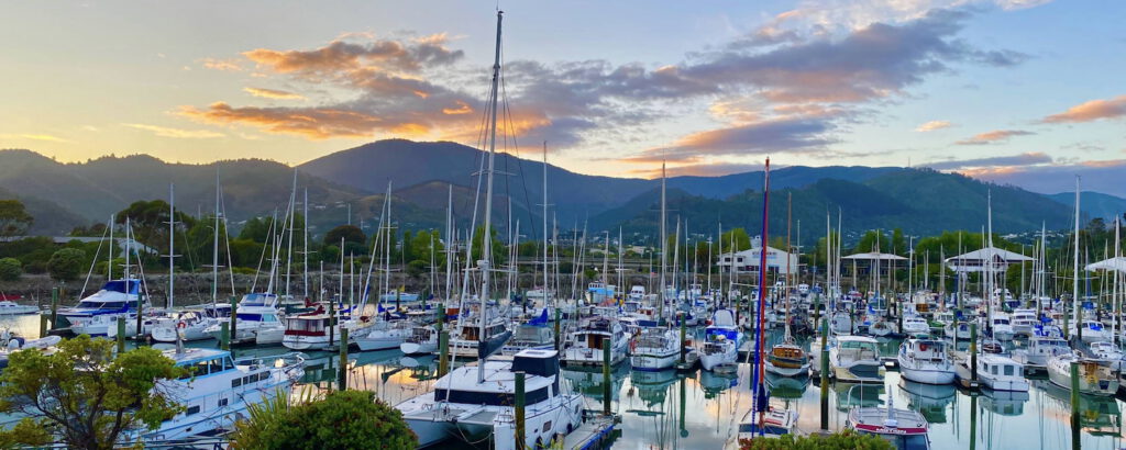 Looking out over the marina at sunrise from Harbourside Nelson studios and apartments