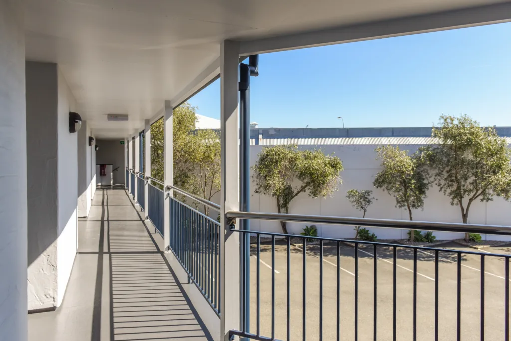 Upper walkway along the Marina View rooms overlooking the courtyard